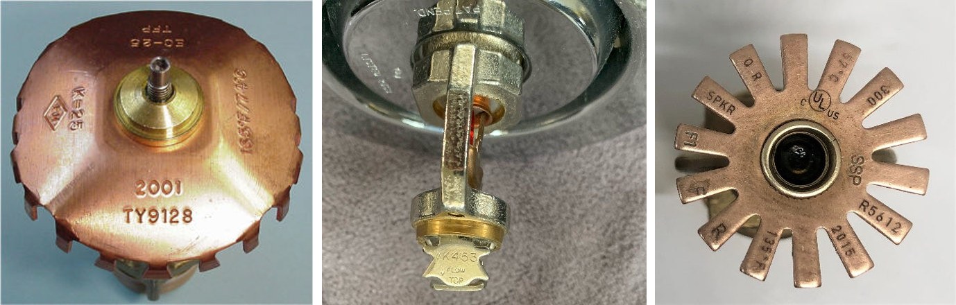 Three sprinkler deflectors showing stamped SIN markings